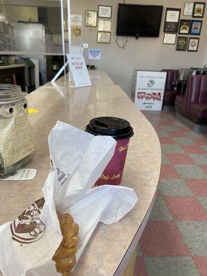 Coffee & donut on counter (4.15)