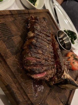 35-day dry aged 18oz Porterhouse Steak cooked Medium Rare