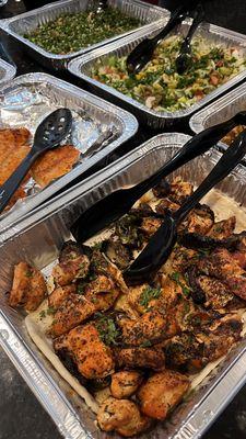 Catering order with Chicken Kebab, Lamb Kebab, Pomfret Fish Baked, Tabouleh Salad, Eggplant Salad, Rice and Hummus