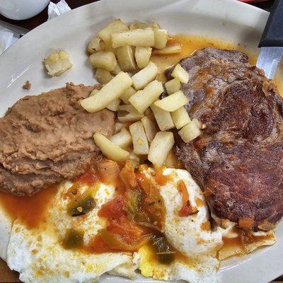 Huevos ranchero with steak