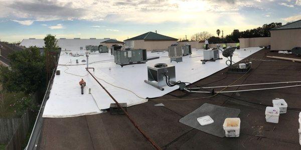 Flat roof recover in Houston Tx