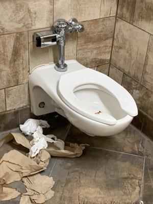 Photo of men's restroom. Disgusting!