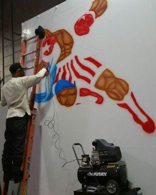 airbrush mural at militia fight academy