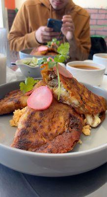 Birria quesadillas and chocolate ganache cake.