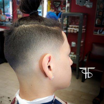 Man Bun with a Drop Fade