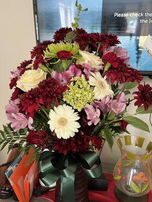 Anniversary bouquet with my wedding colors cranberry and Hunter green!  Just beautiful!