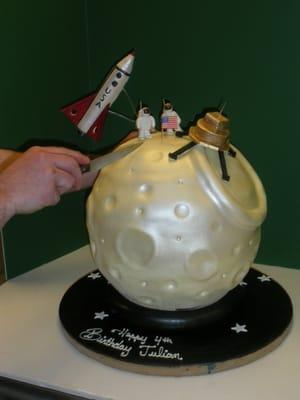 What a lucky kid! A 3D moon complete with astronauts. The shuttle shot out sparklers, of course!