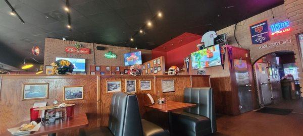 Dining area with decor and entertainment.