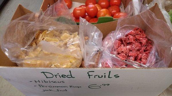 Candied jackfruit and hibiscus blossoms, and dried persimmon