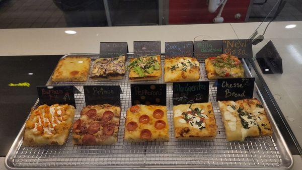 Display of all pizza types excluding thin crust, cinnamon rolls and the various cake types. Try Uncle G and thank me later.