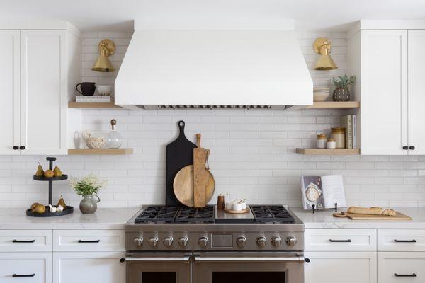 Beautiful kitchen hood, and lovely floating shelving!