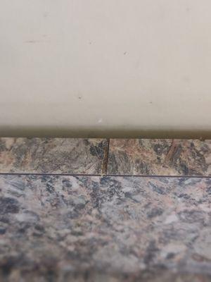 Cut the granite strip behind the kitchen sink