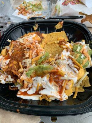 Nachos (cheese, chili, onions, sour cream, guacamole, habanero sauce, shredded cheese)