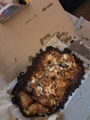 This is what we got from dominos tonight. I think it's chicken. Well that's what we ordered. The assistant m d'nt believe me.no refund.