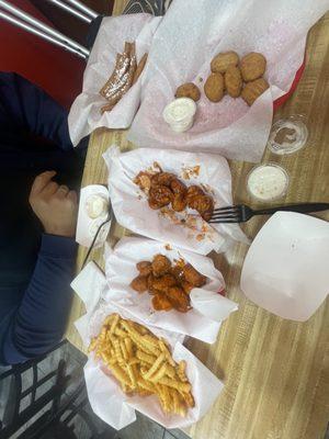 Large fries, hot garlic 10 piece, Buffalo bbq 10 piece, Mac n cheese bites, funnel cake fries