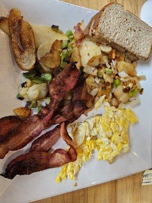 Broadway Platter with Southern Potatoes, bacon, and toast.