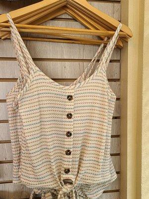 This adorable stripped tank top is a must have in the closet for warm summer days.