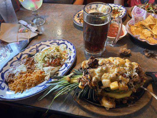 Steak and shrimp fajita served in a half pineapple! Delicious!