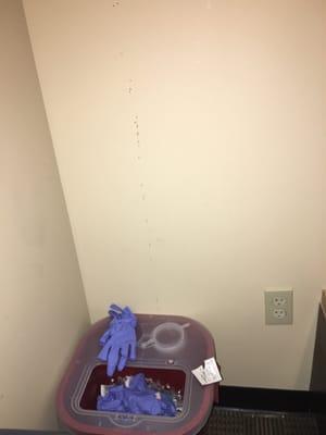 Blood squirting up the wall, open sharps box...completely disgusting.