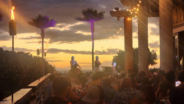 Maori dancers; evening view.