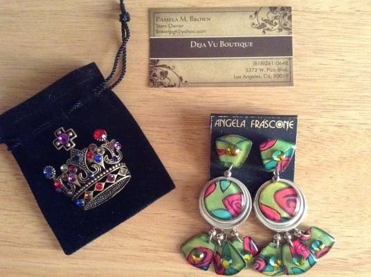 I absolutely love the crown pin and funky earrings!!