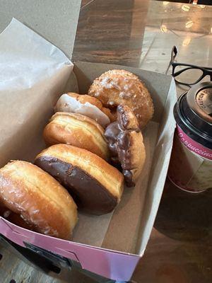 From top to bottom. Crumb-cake frosted-maple-chocolate frosted-OG Glaze. Old fashioned on the side .