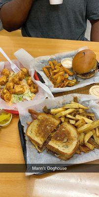 Delicious Patty melt (bottom) THE BEST firecracker shrimp to the left and the buffalo bleu burger (top)