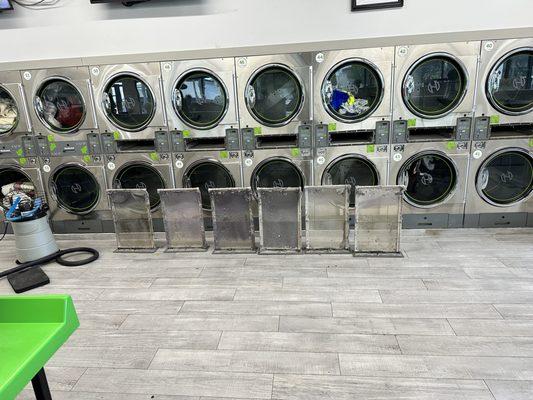 Multiple dryers and lint tray cleaning job at a laundromat