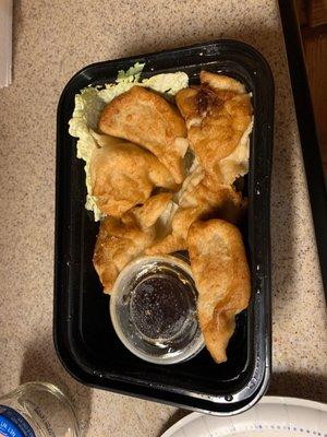 Fried pork dumplings. Takeout