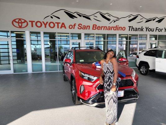 Me next to my first ever brand new car. I love this car! The people and service is great!