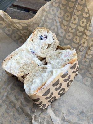 Rosemary bagel with lemon blueberry cream cheese