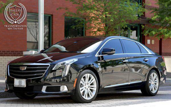 Our luxury Cadillac XTS, ride in style!