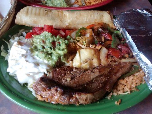 Mouth watering ... Steak Ranchero with all the fixings excellent service! Go to have fun and to bring family and friends.