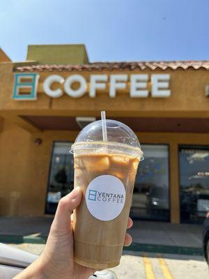 Iced lavender vanilla bean latte with oat milk