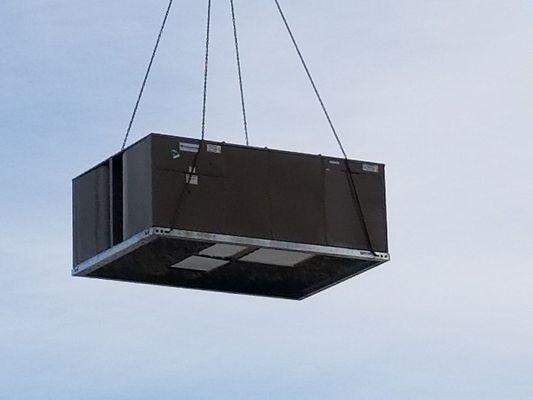 Unit being lifted onto Vantage point building