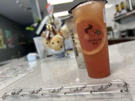 Grapefruit and Peach Green Tea with Grapefruit Jelly in the front. Taro Bubble Milk in the back.