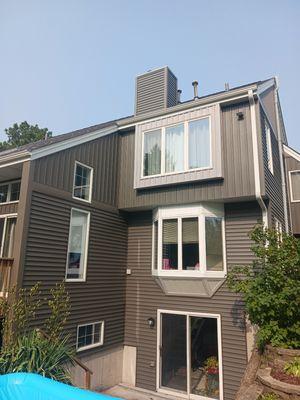 Siding installation with vertical board and battan siding