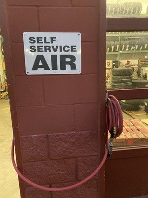 Complimentary Self-Service Air Pump is at the Tire Center across the gas pumps