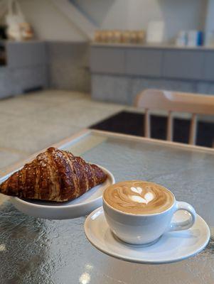 Sesame pretzel croissant with cappuccino