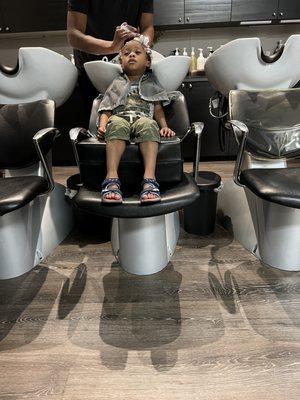 At the salon, during the wash session!