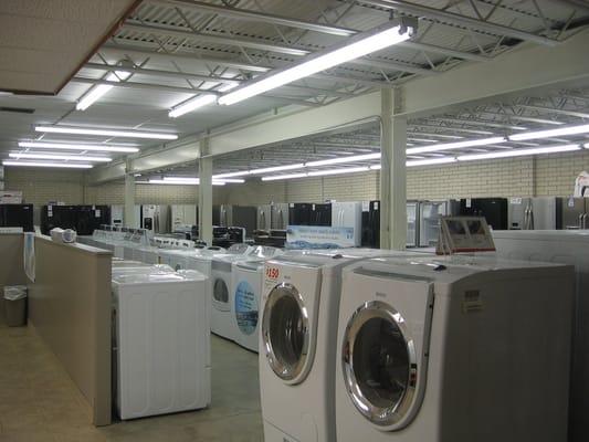 The back room at Lytton's Appliance - showcasing microwaves, ranges, washer/dryers, refrigerators and more