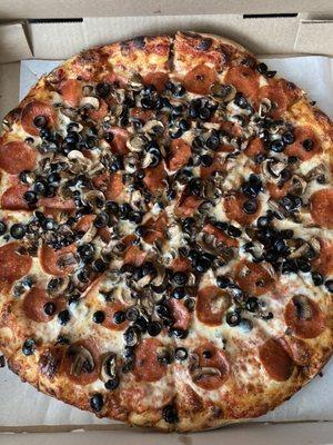 The one and only BLUE COLLAR with pepperoni, mushrooms, and black olives. It's a beautiful thing.