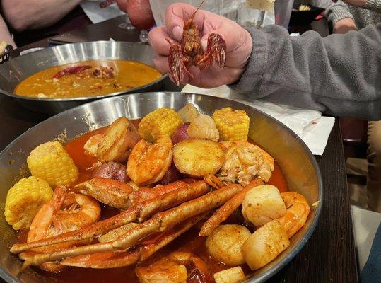 The Boilery - Scallops, Shrimp, crab legs, potatoes, and corn on the cob.