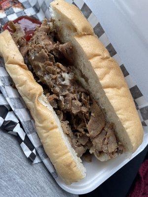 This is Giovanni's Idea of  "Cheese Steak Hoagie w/ Extra Cheese and Meat, add Fried onions & Ketchup"