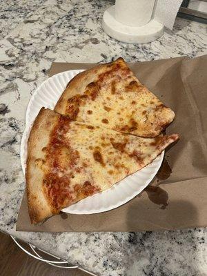 Pizza slices leaked grease all over bag and car seat