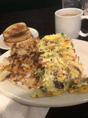 Custom omelette, home fries, and rye toast. Don't forget the coffee & glass of ice water!