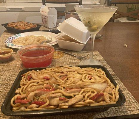 Double Dragon.  House Special Lo Mein, Dry Martini, and Sesame Chicken with brown rice in background.