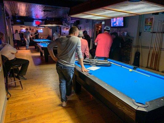 Three pool tables - a serious pool crowd was playing this night