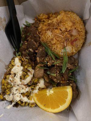 Chicken adobo , coconut rice and corn