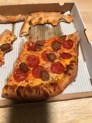 Great pizza with plenty of cheese, pepperoni, and sausage.